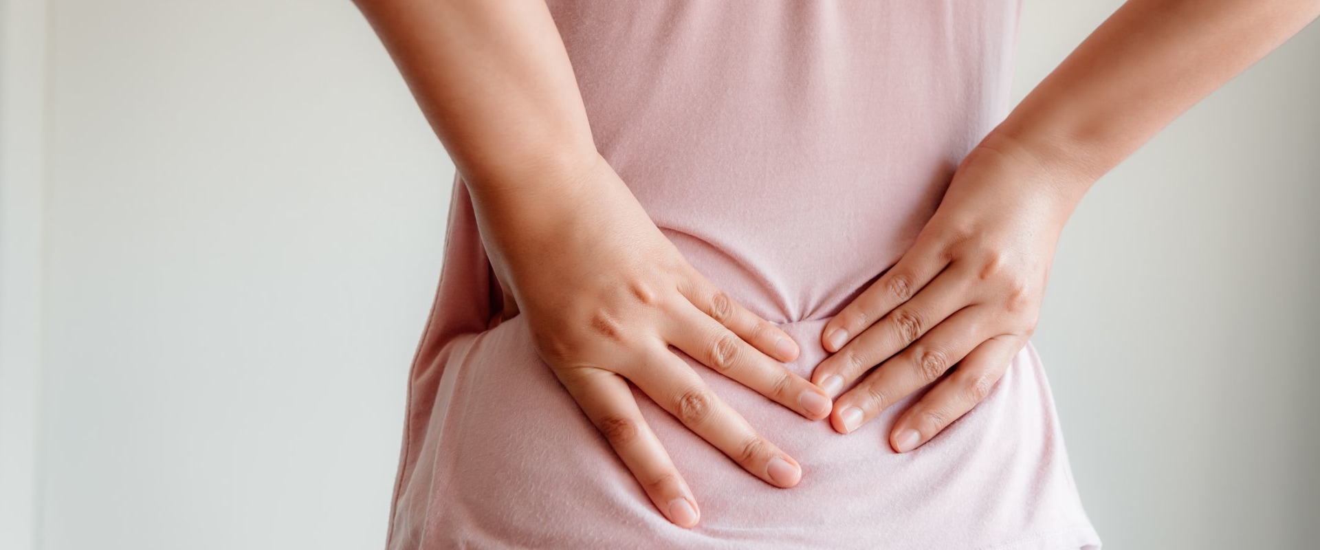 Why back pain occurs in female?